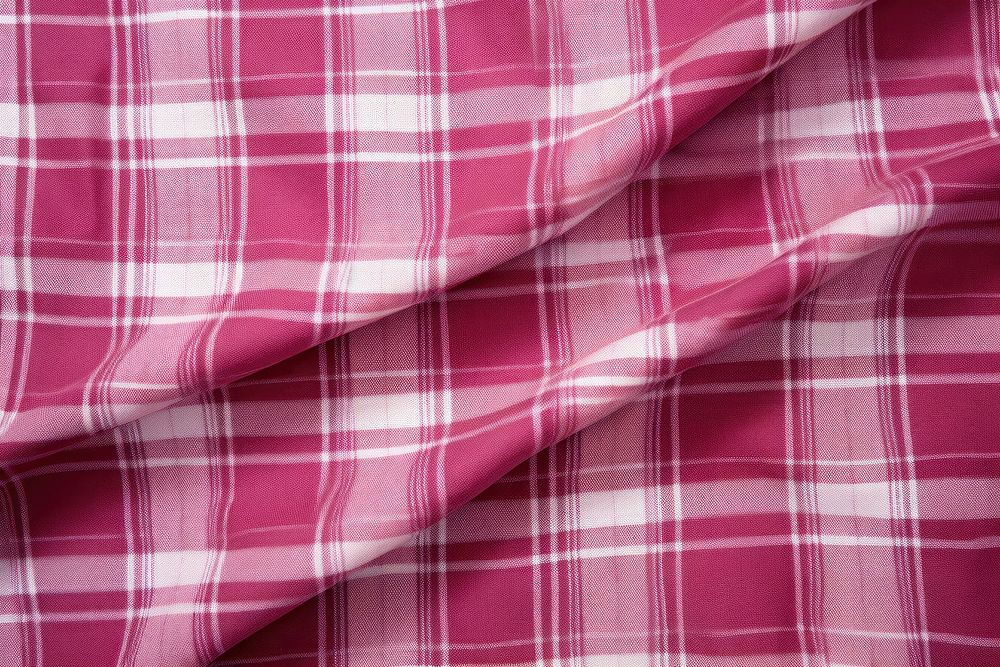 Plaid patterns rose color tablecloth clothing apparel.