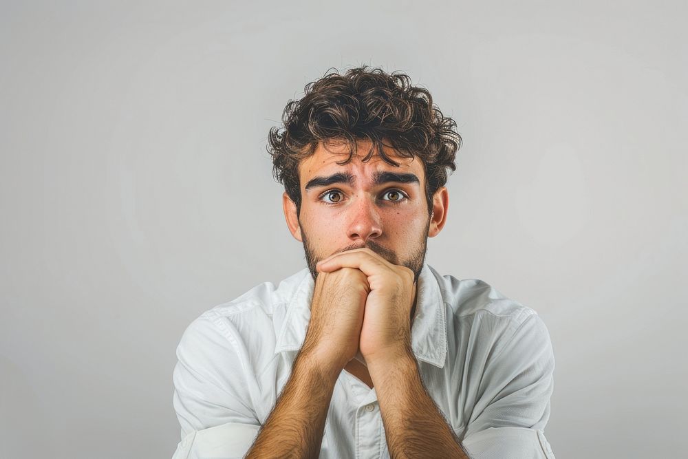 Worried man with white shirt portrait adult photo.
