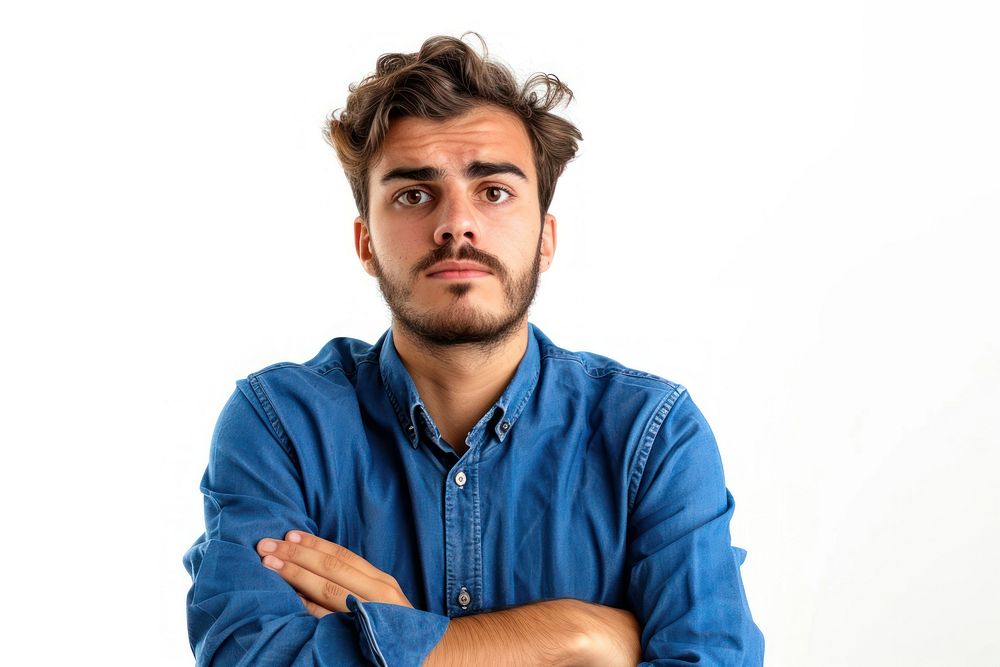Worried young man with blue shirt portrait adult photo.