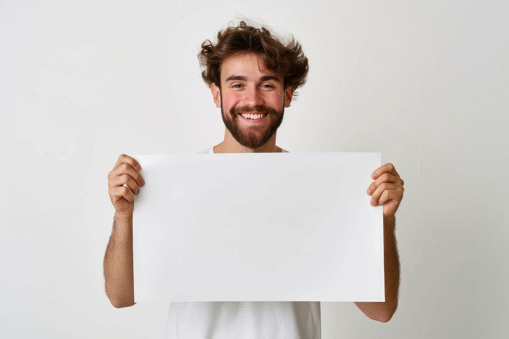 Happy man holding blank poster portrait smile adult.