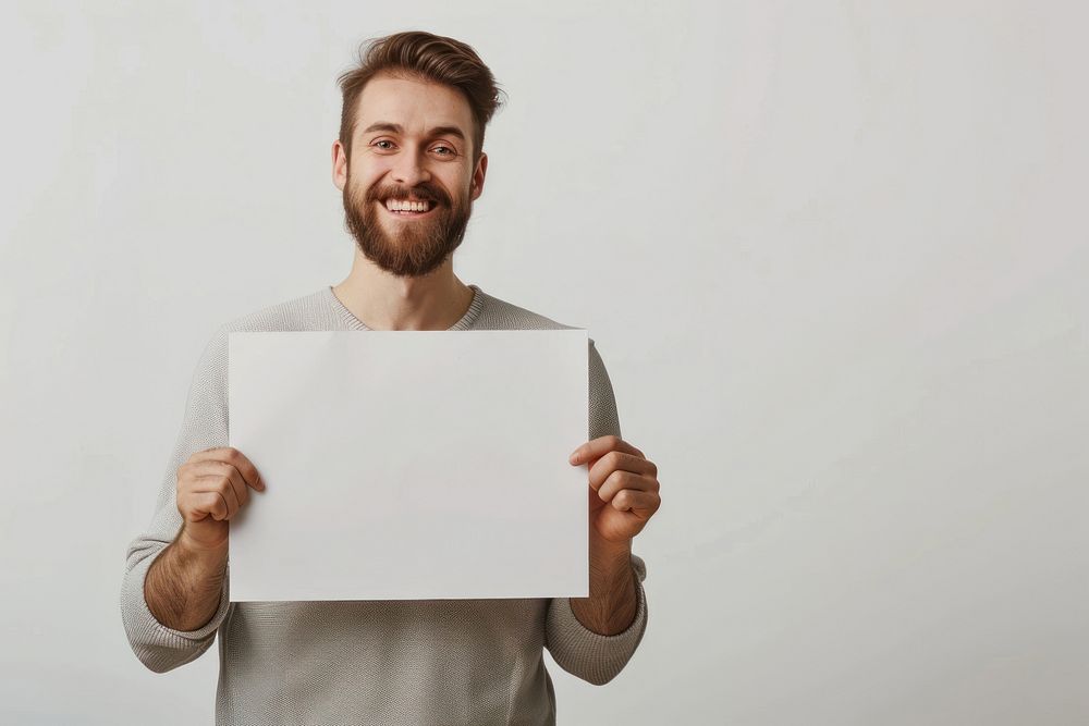 Happy man holding blank poster portrait adult smile.