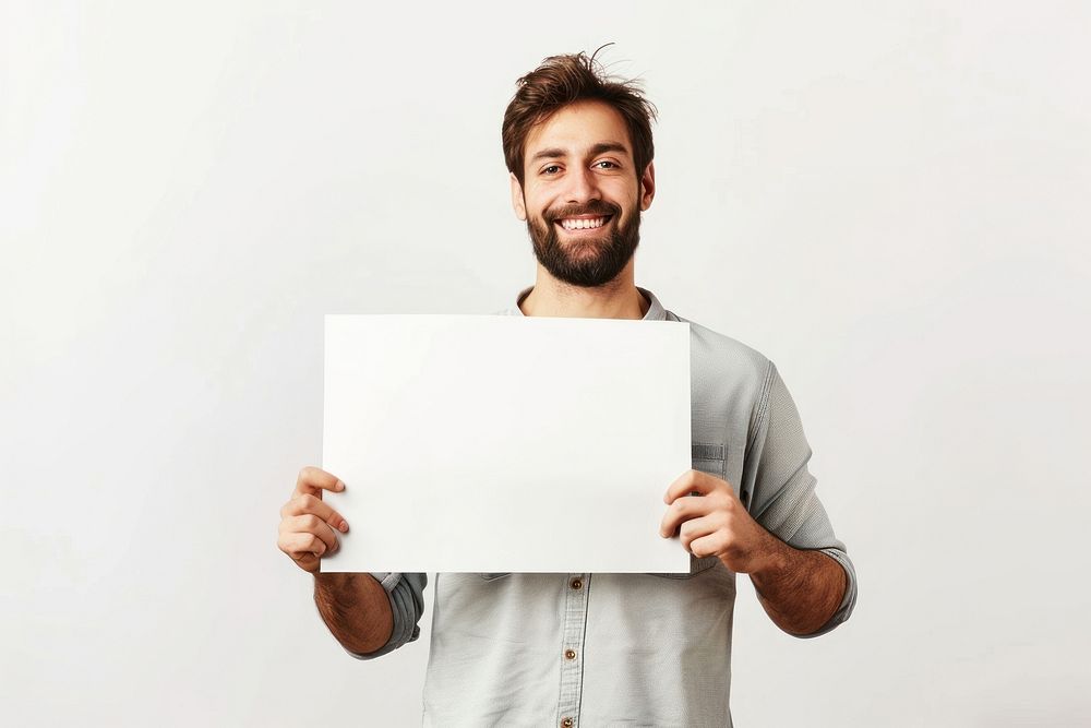 Happy man holding blank poster portrait adult smile.