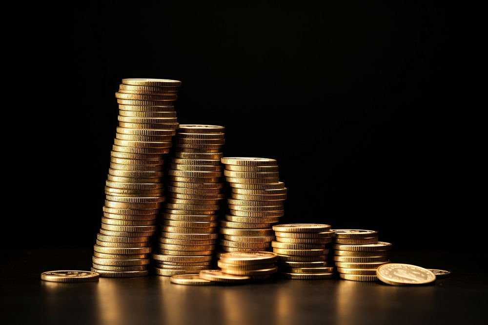 Coins stack money investment darkness.