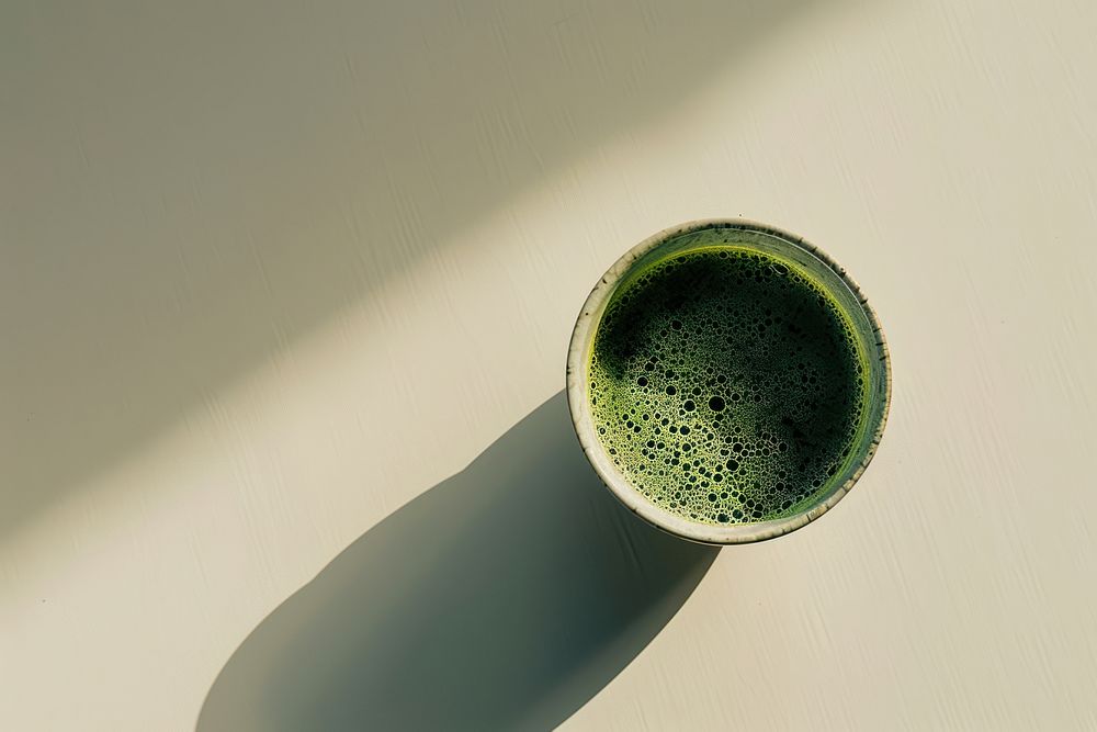 Matcha green tea porcelain cookware beverage.