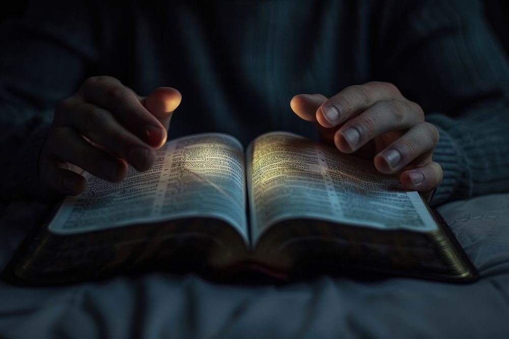 praying-hands-on-open-bible-book-premium-photo-rawpixel