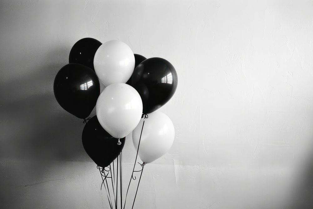Black and white balloons anniversary celebration decoration.