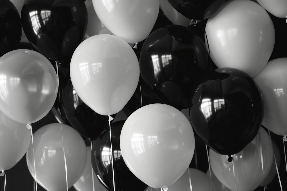 Black and white balloons backgrounds celebration anniversary.