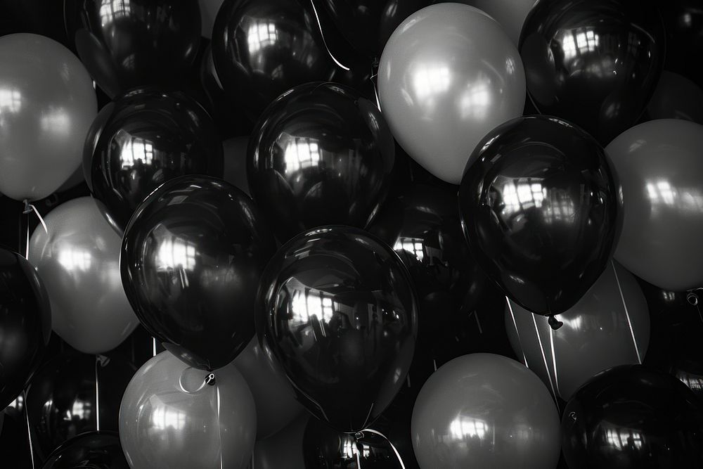 Black and white balloons backgrounds celebration repetition.