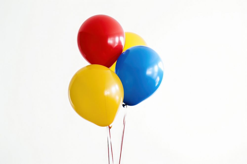 Primary color balloons white background anniversary celebration.
