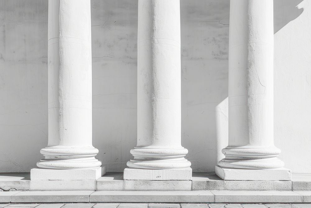 White pillars of Roman-era Temple architecture column monochrome courthouse.