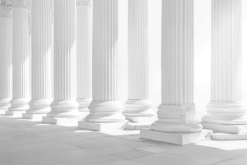 White pillars of Roman-era Temple architecture column backgrounds repetition.