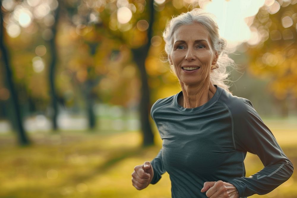 Mature woman running jogging female.