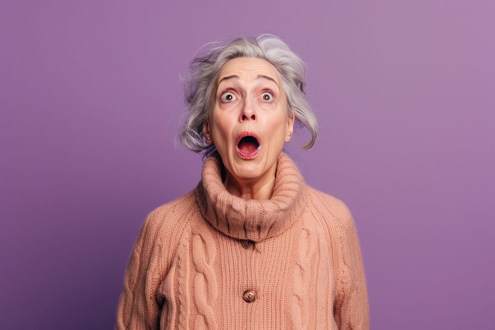 Mature woman surprised clothing knitwear.