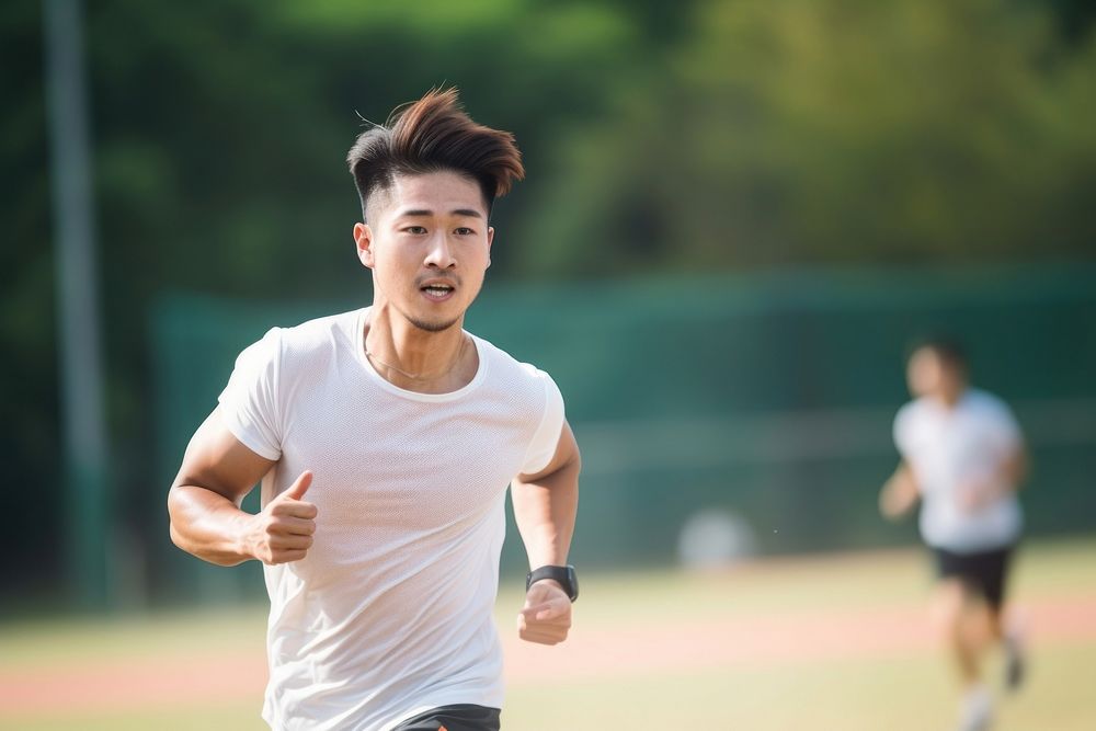 Sout east asian student man athletic wristwatch running jogging.
