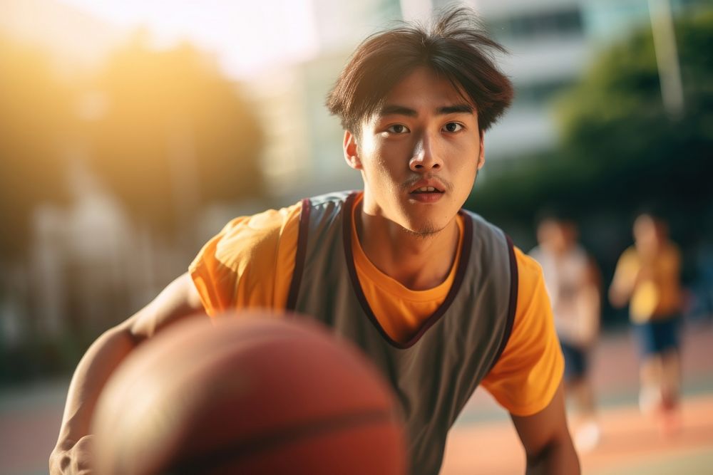Sout east asian student man athletic basketball playing basketball person.
