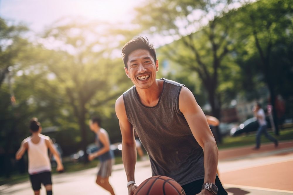 Sout east asian senior man athletic basketball playing basketball transportation.