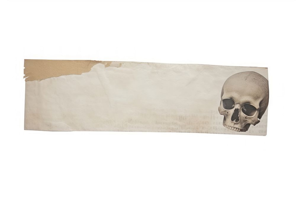 Adhesive tape is stuck on a skull ephemera collage paper art white background.