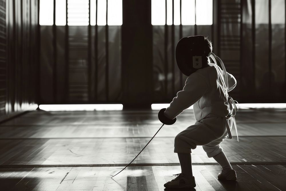 Child practicing fencing flooring sports child.