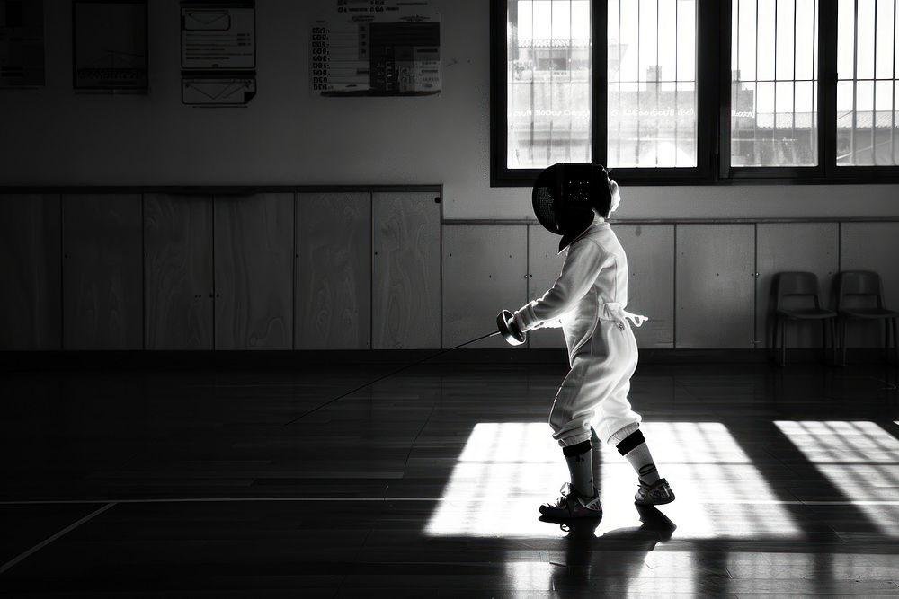 Child practicing fencing sports child adult.