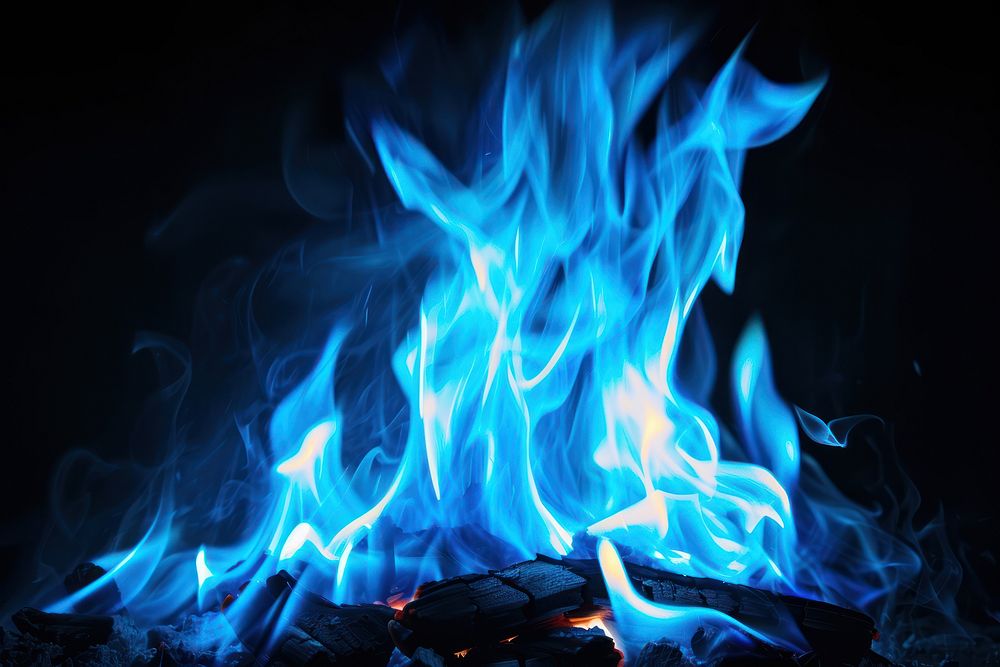 Mountain fire flame bonfire blue black background.