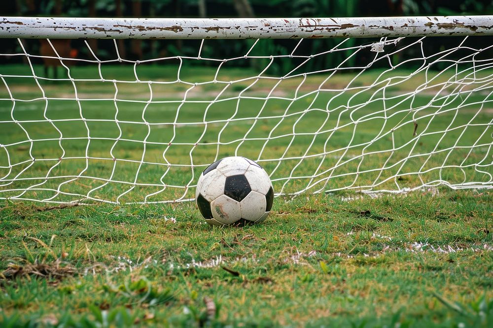 Soccer ball in goal football sports competition.