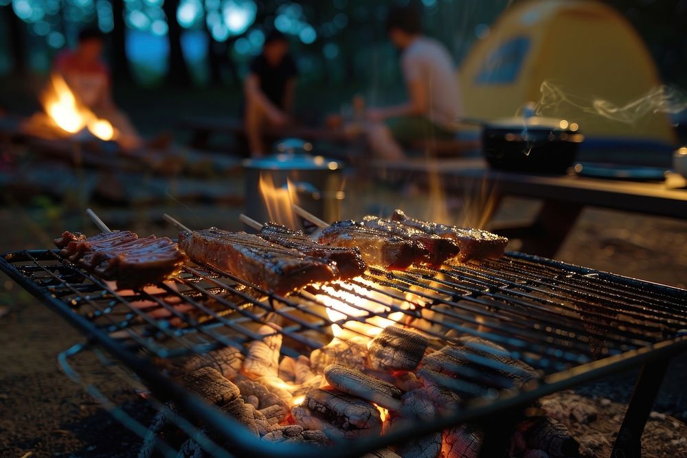People party camping with BBQ grilling meat bbq cooking person.