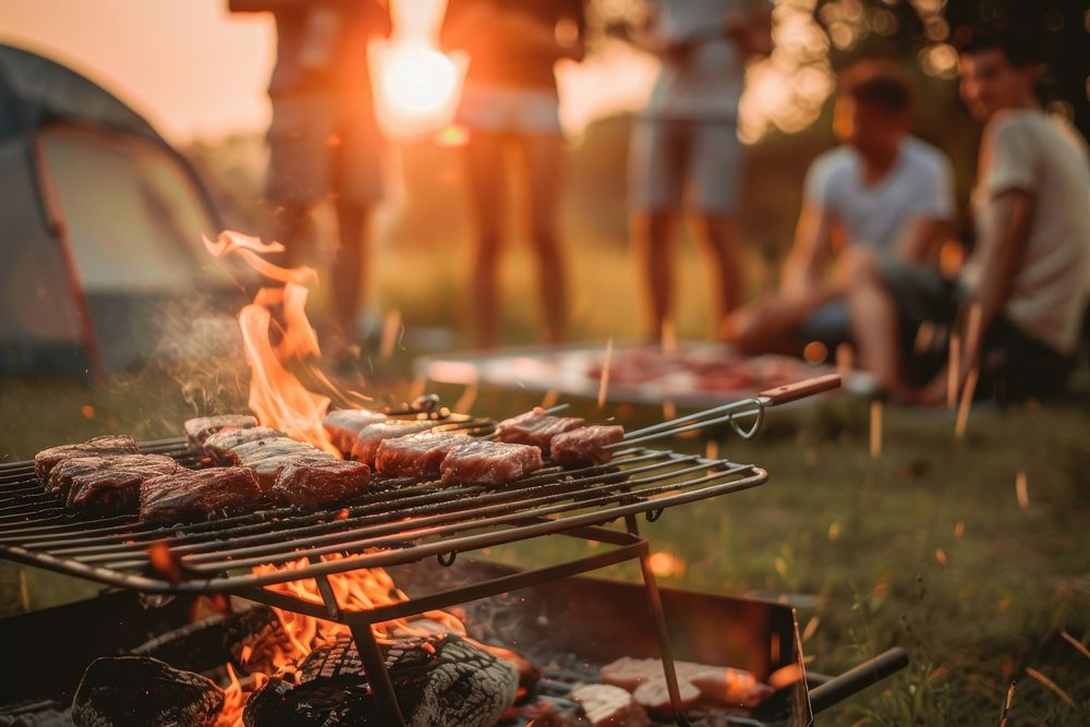 People party camping with BBQ grilling meat bbq cooking person.