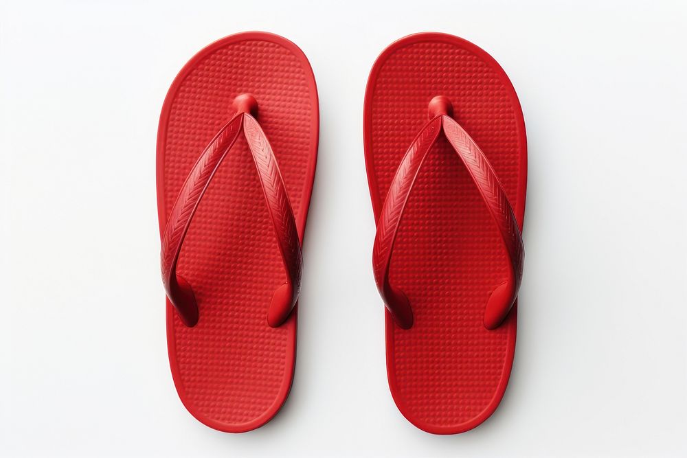 Red pair of flip flops flip-flops footwear white background.