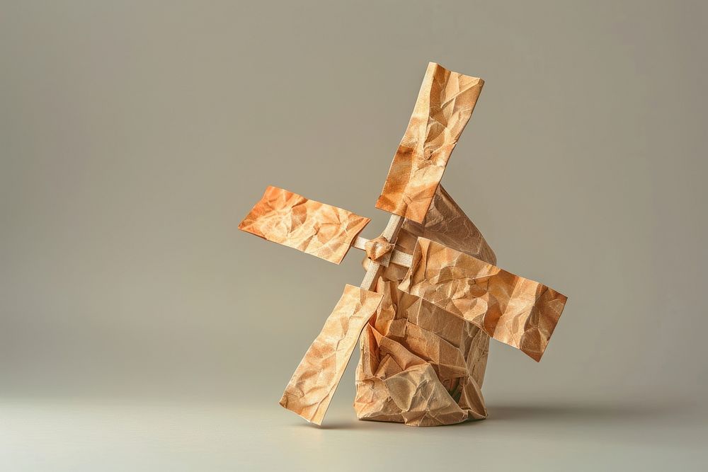 Windmill in style of crumpled paper origami wood.