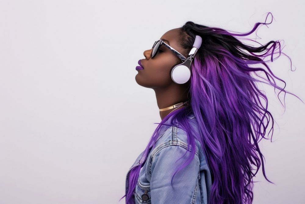 Teenage woman wear headphone headphones purple sunglasses.