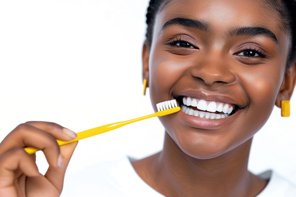 Teenage woman holding brush teeth toothbrush portrait smile.