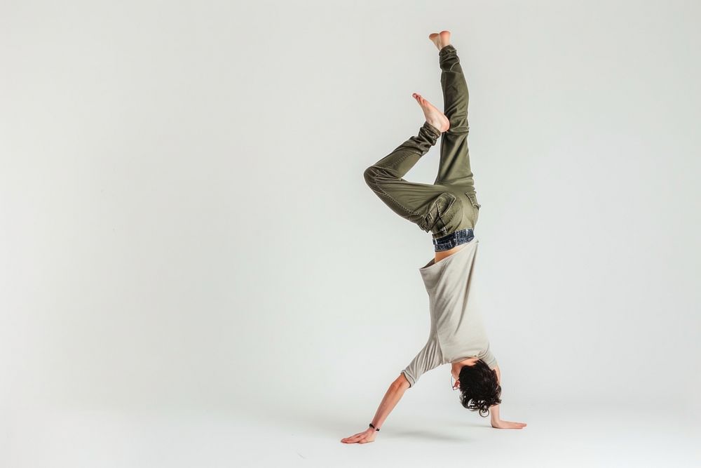 Teenage man handstand dancing sports yoga.