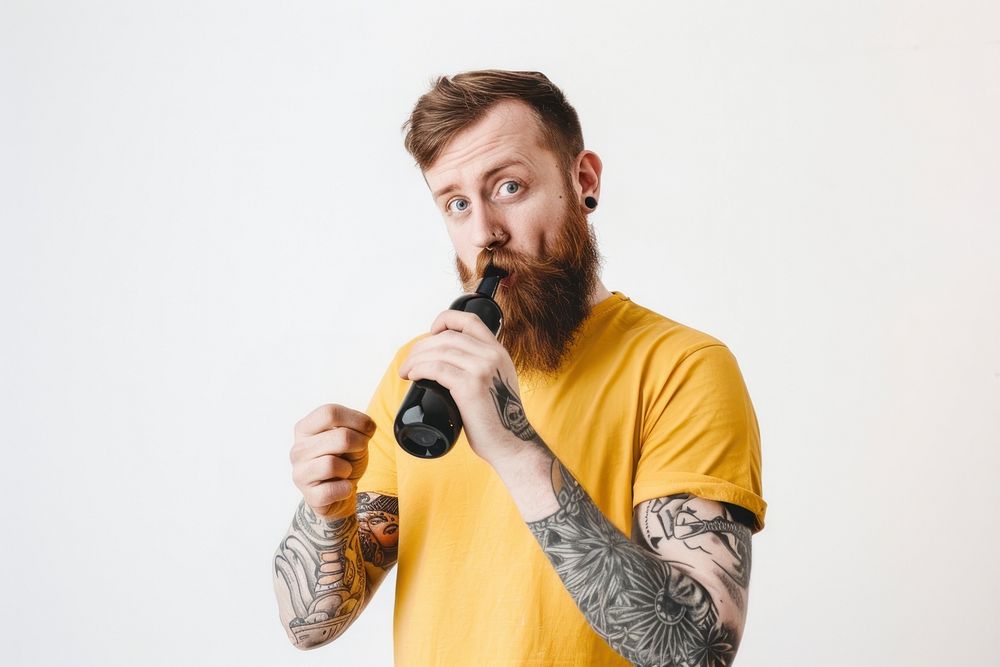 Teenage man straw bottle portrait tattoo microphone.