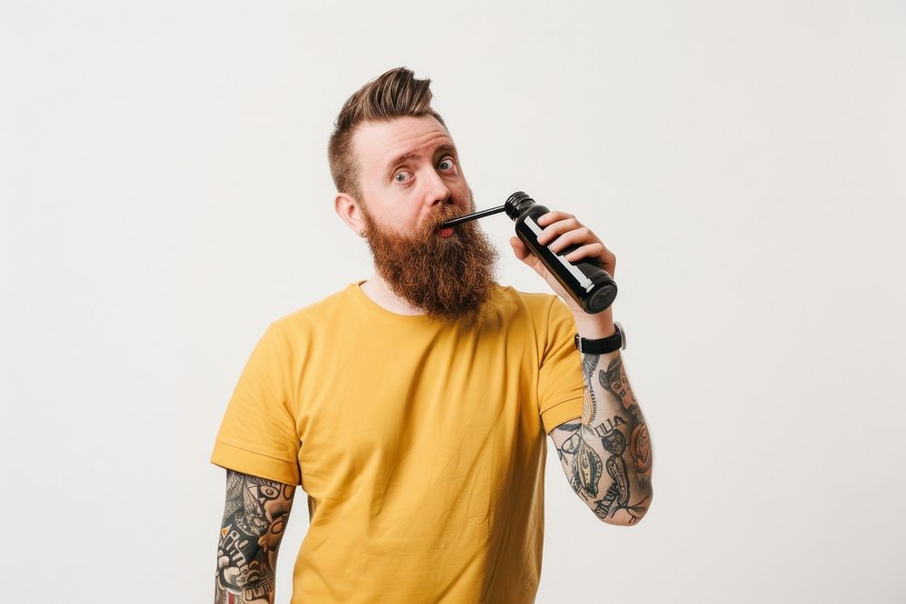 Teenage man straw bottle tattoo microphone portrait.