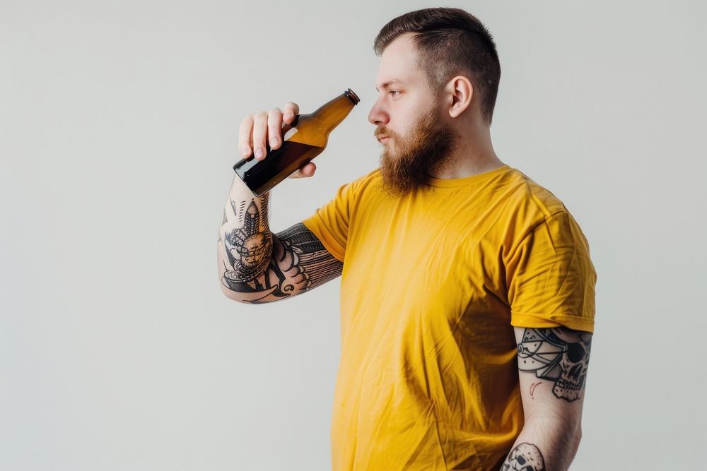 Teerage man straw bottle tattoo portrait drinking.