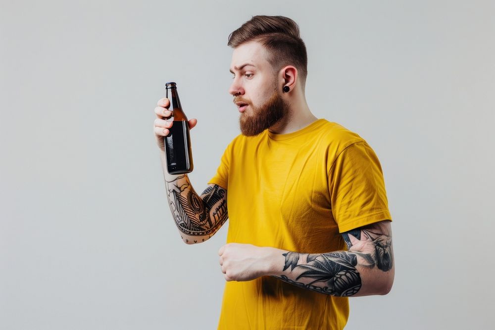 Teerage man straw bottle portrait tattoo yellow.