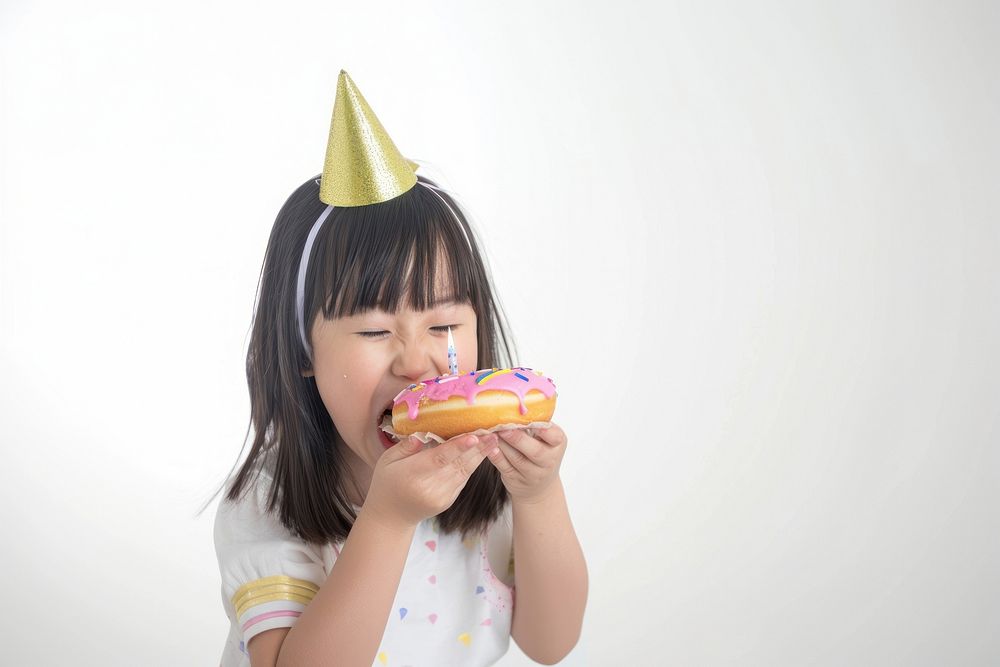 Asia girl eatting donut portrait birthday eating.