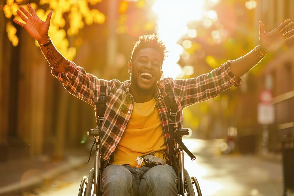 Man on a wheel chair laughing portrait adult.