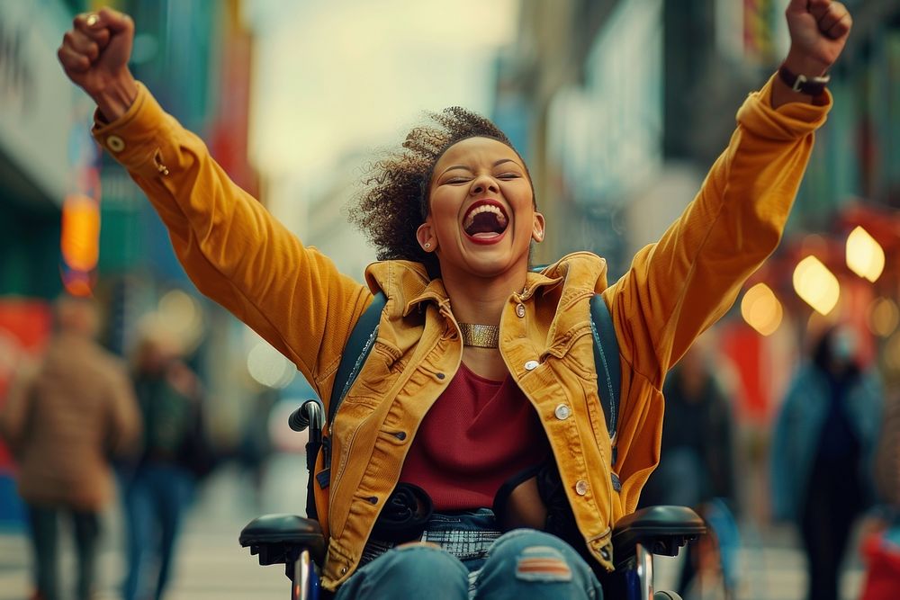 Woman on a wheel chair shouting laughing portrait.