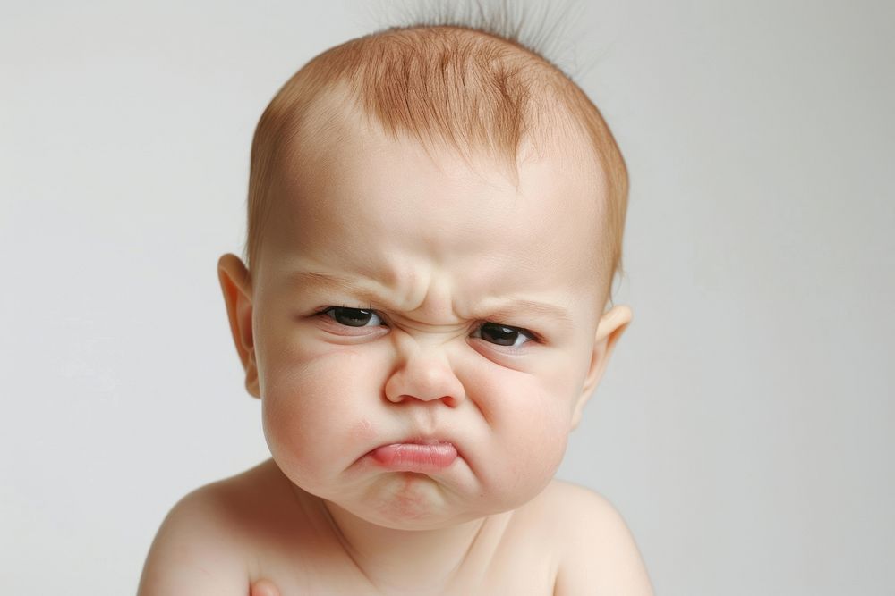 Angry baby portrait crying disappointment.