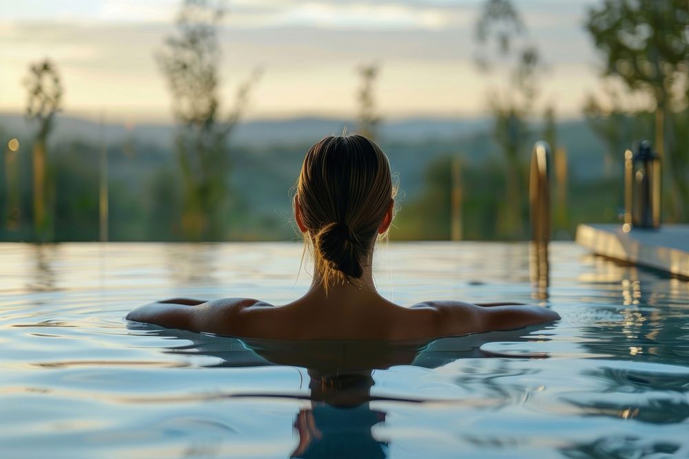 Girl enjoying relaxing swimming adult tranquility.