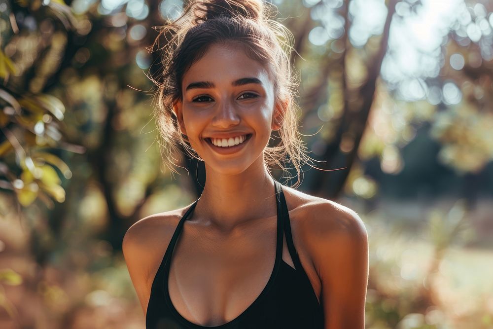 Athletic girl doing fitness laughing outdoors smile.