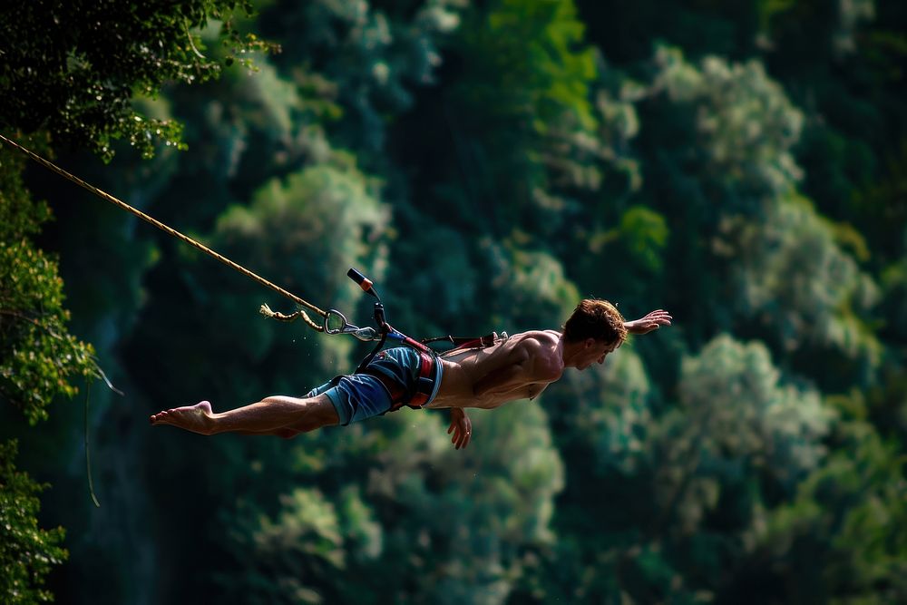 Man in bungee jumping recreation adventure outdoors.