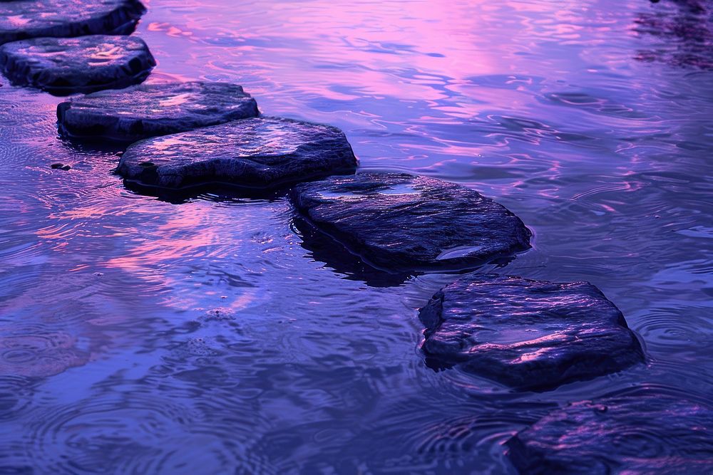 Stones on a waterline outdoors nature purple.