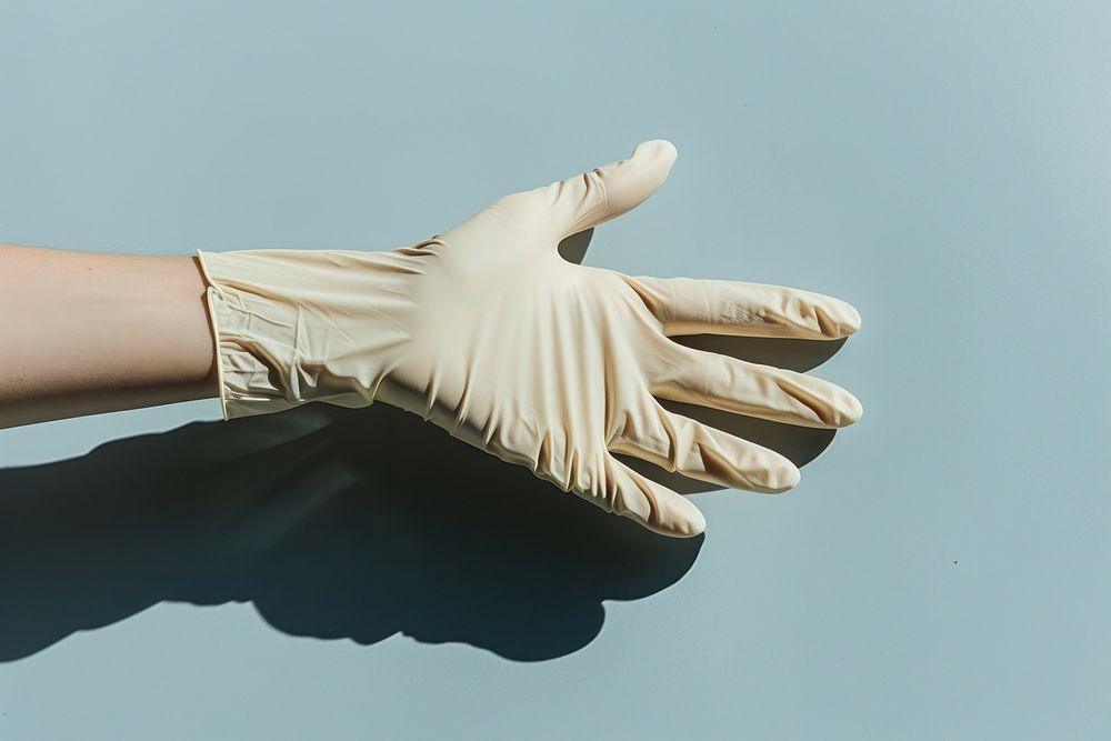 Hand wearing a glove clothing baseball softball.