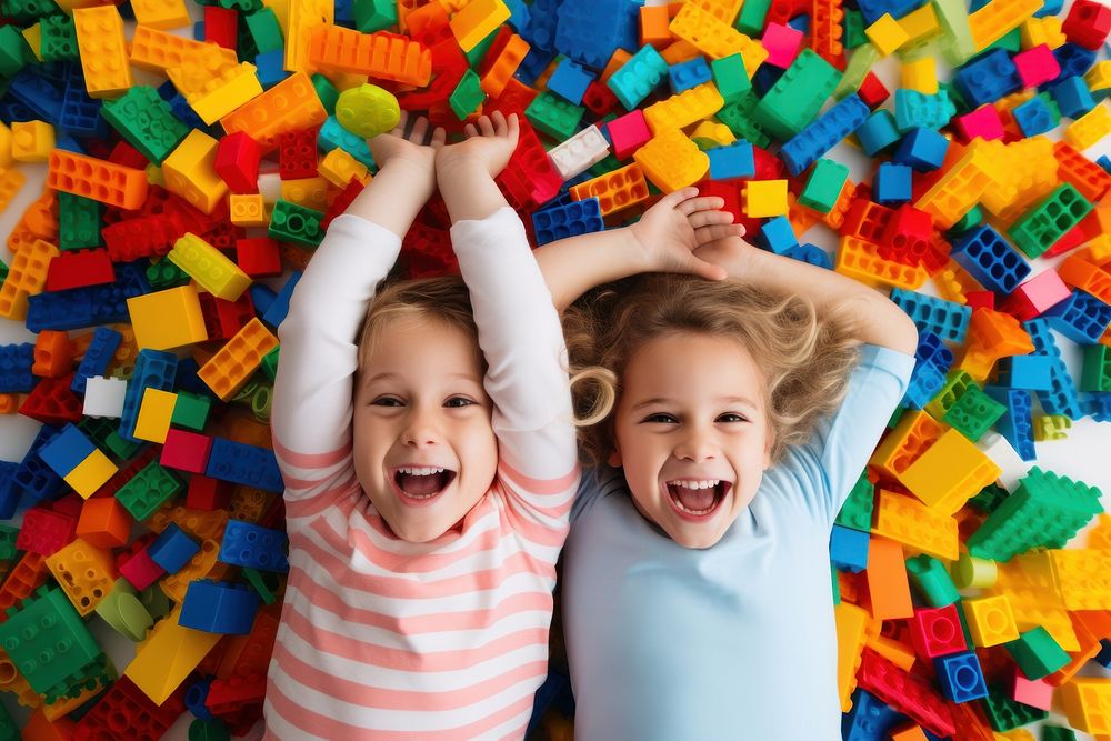 Children play with colorful plastic toy blocks photo happy photography.