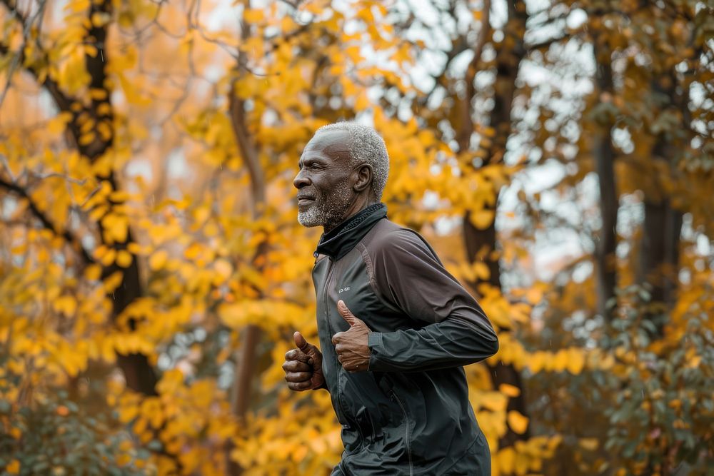 Black senior man running jogging person autumn.