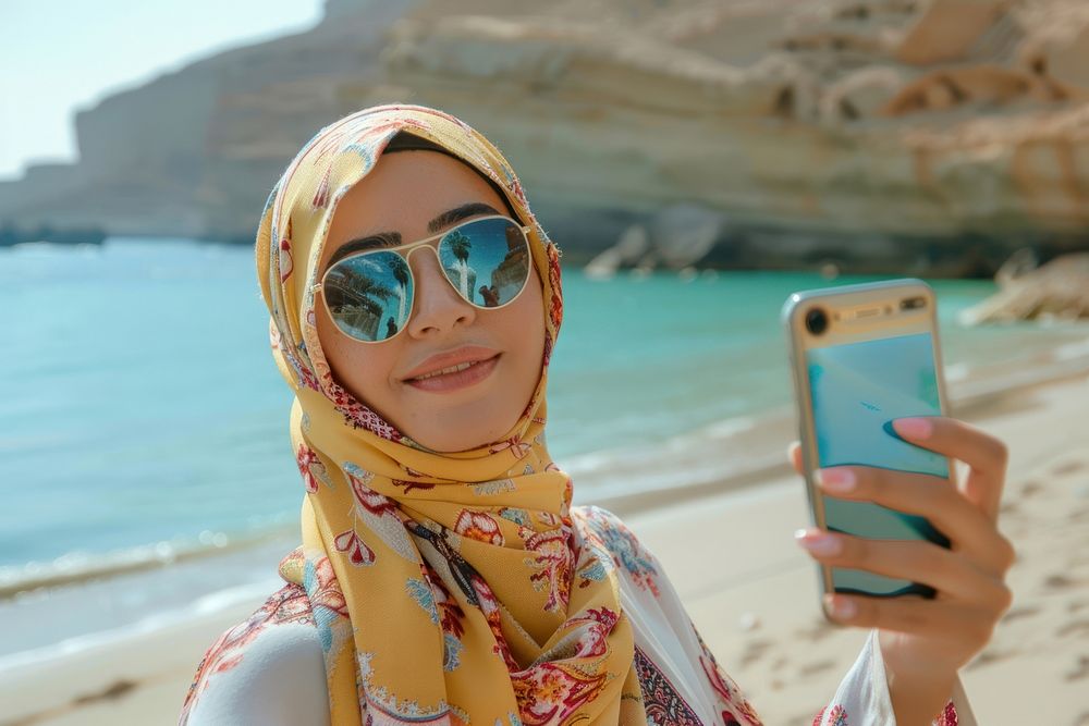 Middle eastern woman selfie photo electronics.