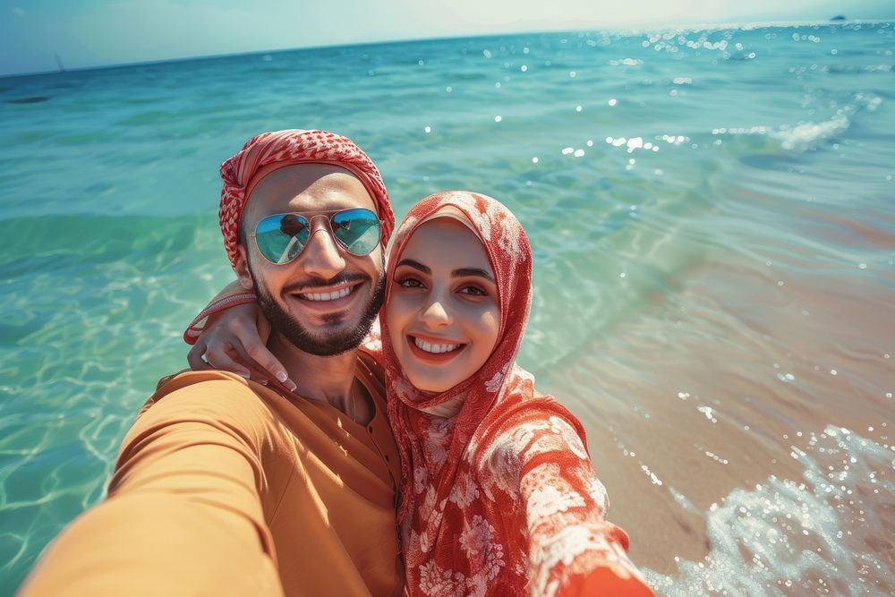 Middle eastern couple selfie photo beach.