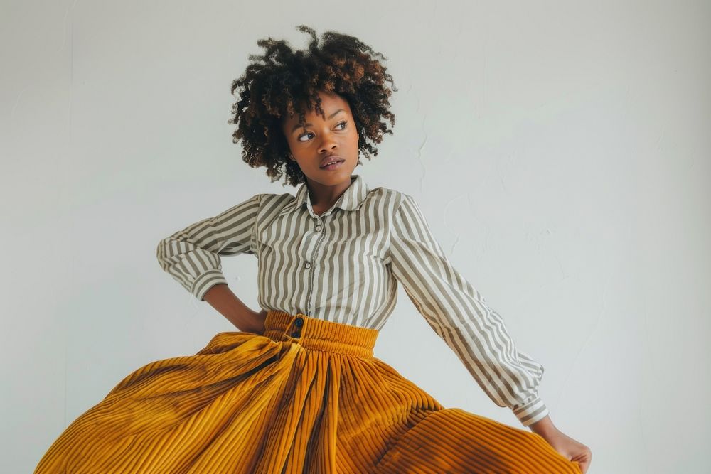 Retro charm in a mustard yellow corduroy skirt clothing apparel fashion.